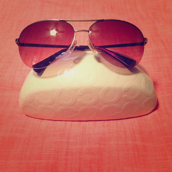 Authentic Coach aviators.