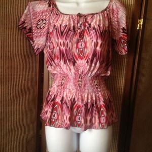 Dressy pink and black top with small peplumRESERVD