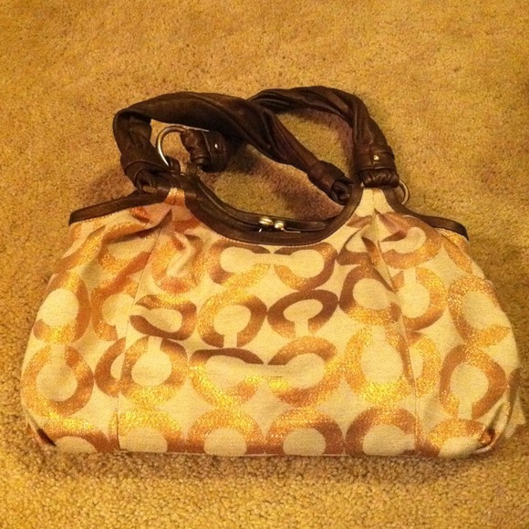 Hold Big C coach purse