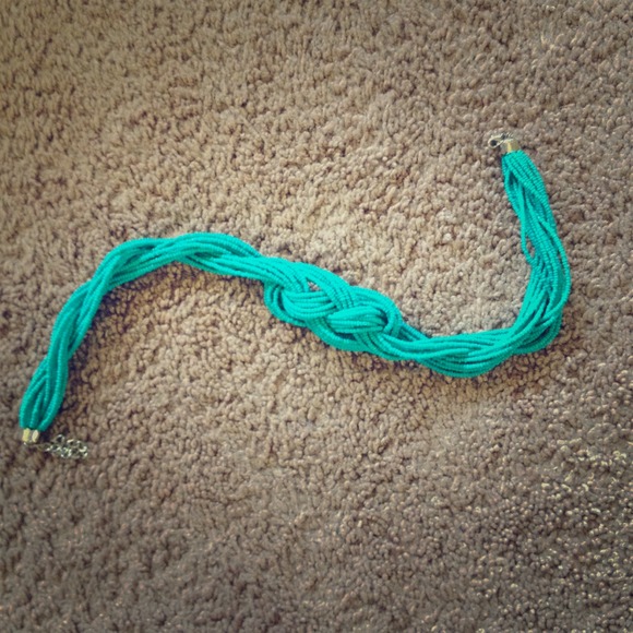 Teal, beaded and knotted necklace.