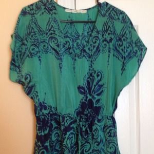 Cute green blouse with navy specs