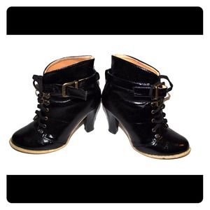 Hightop patent leather boots with buckle