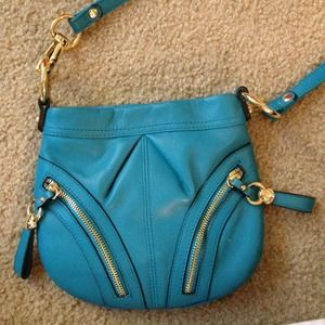 B. Makowsky turquoise cross body