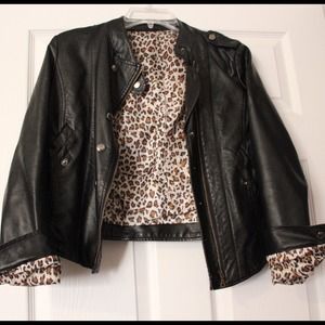 Faux leather jacket with leopard print interior