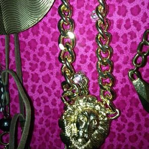 Gold lion necklace