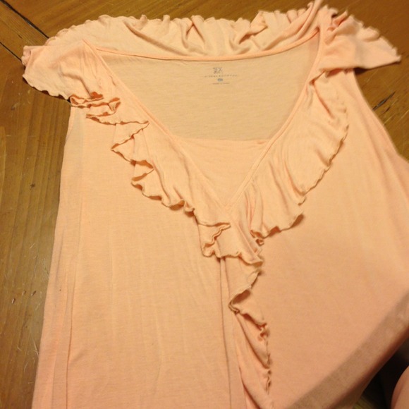 Ruffled peach sleeveless shirt