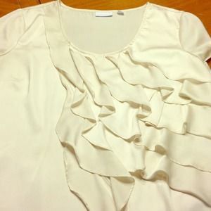 Cream colored ruffle top