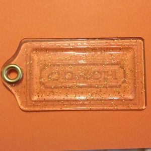 Authentic coach hangtag charm