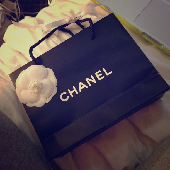 Chanel Paper Bag with Flower and Ribbon.