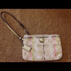 100% Authentic Coach wristlet.