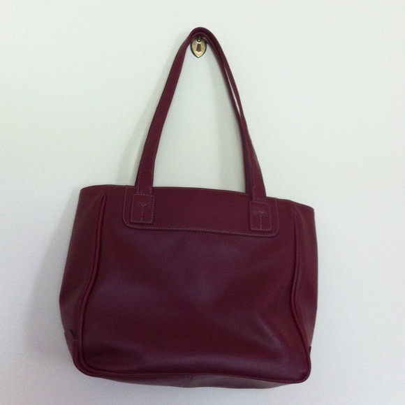 New burgundy leather hand bag