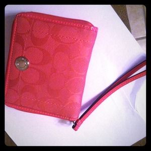 Coach pink zip wristlets wallet! HOLD