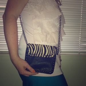 Like new faux zebra fur and faux leather purse
