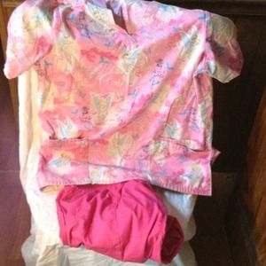 A set of pink tinkerbell scrubs