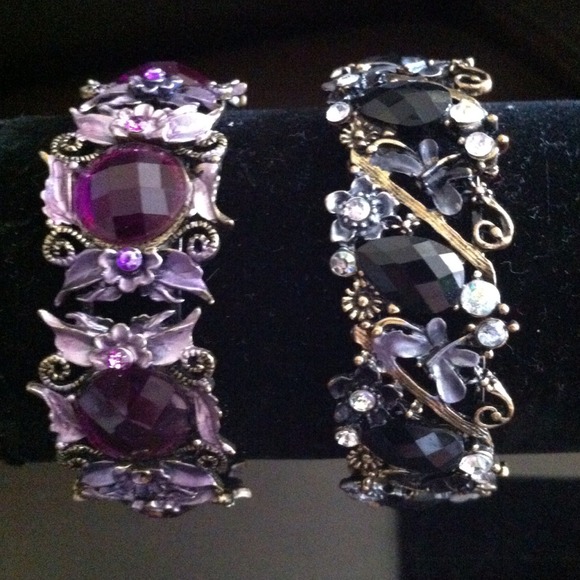 ❤ bundled a purple and black cuff bracelets.