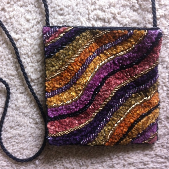 GAVE TO GOODWILL Multi colorcross body frm Paris!!