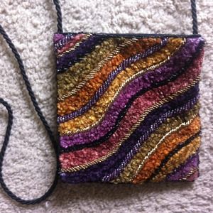 GAVE TO GOODWILL Multi colorcross body frm Paris!!