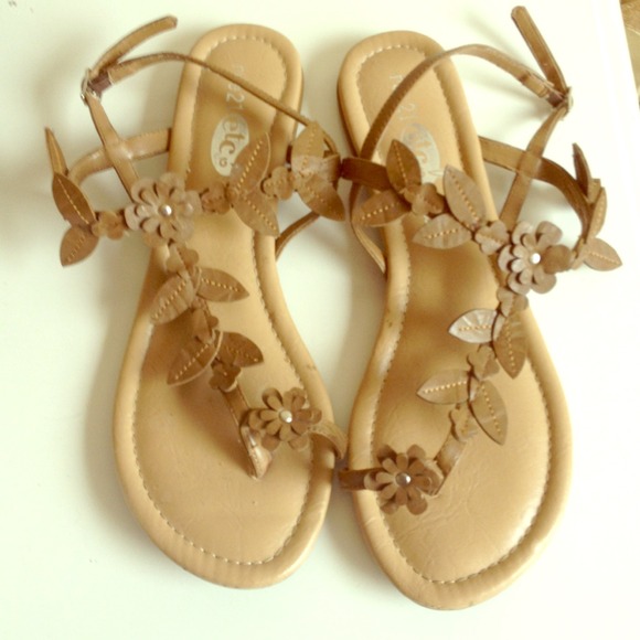 T strap flower sandals.