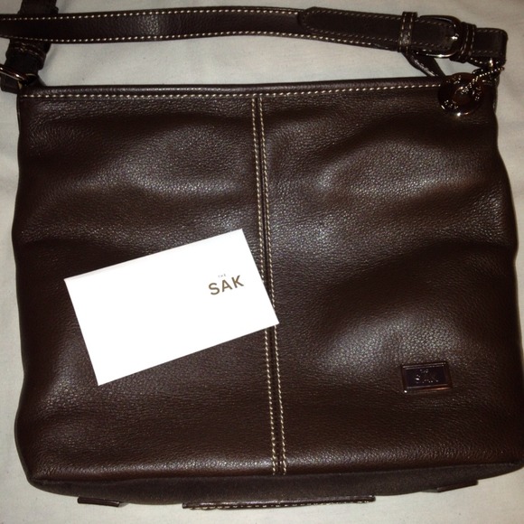 SOLD. 💸 The SAK brown leather hobo or satchel