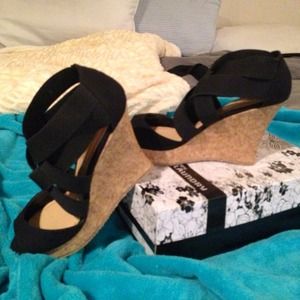 Black stretch strapped shoes. New