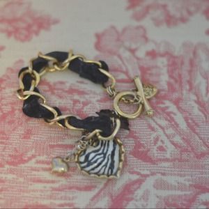 Betsey Johnson zebra heart bracelet.