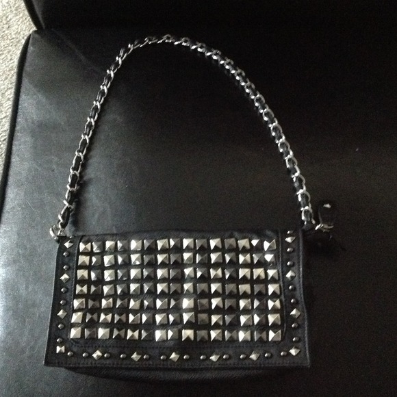 Studded  black clutch with a strap