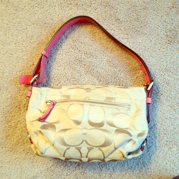Printed Coach purse with Pink leather strap