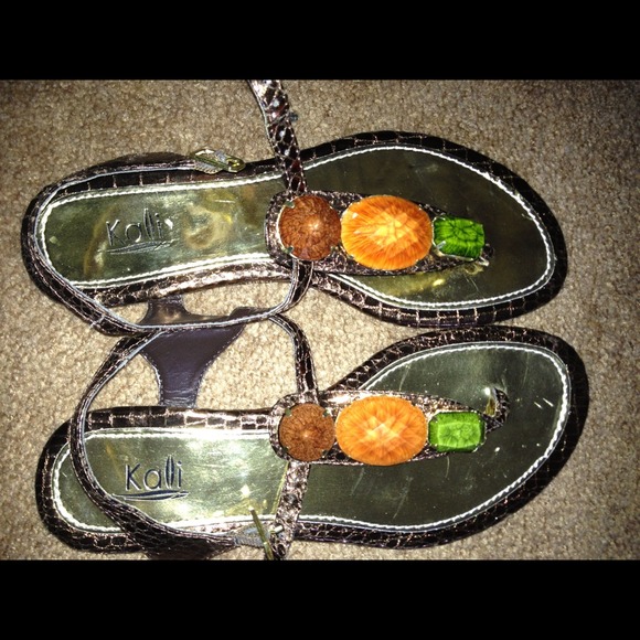 Cute little sandals. Never been worn.  Size 7