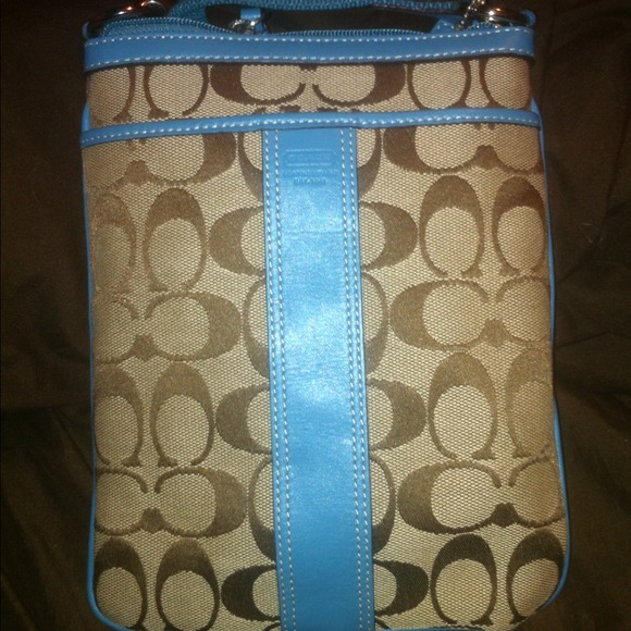 Authentic Coach cross body pouch.
