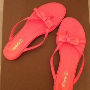 Patent orange sandals.