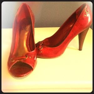 Carlos Santana designed ruby red pumps