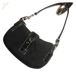 Black Coach purse in classic "C" pattern