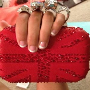 Brand new brass knuckle red clutch