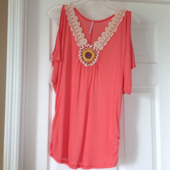 Melon shirt with crochet detail and beadwork.