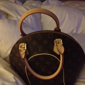 LV bowling bag style handbag