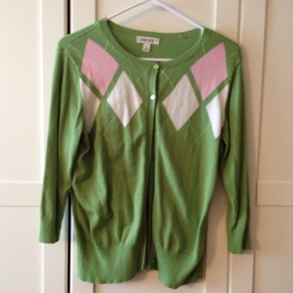 Green argyle sweater.