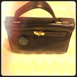 Black leather bag with gold accents