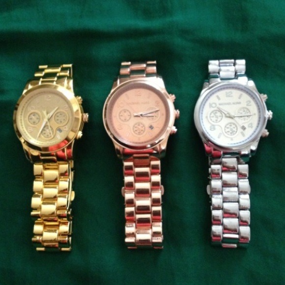 Yellow gold MK watch