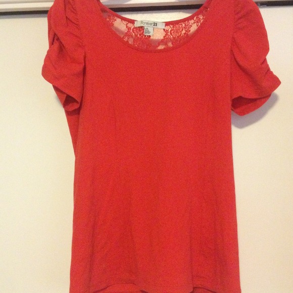 Orange puffy sleeved shirt
