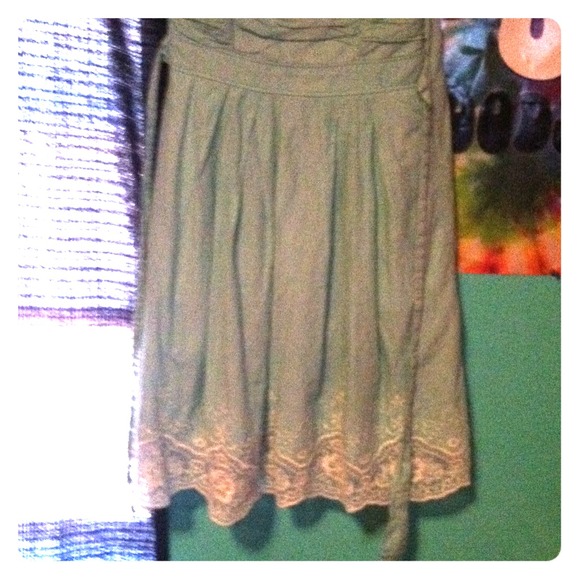 It's a teal with white lace dress strapless!