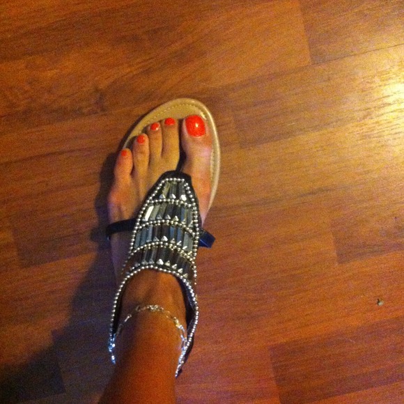 Gold and black sandals