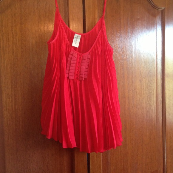 Red, pleated shirt
