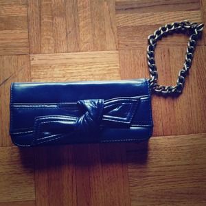 Blue bow clutch from Topshop