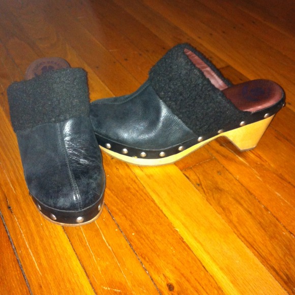 Black leather clogs