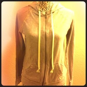 Grey jacket with green accents