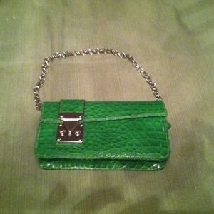 Snake skin clutch handbag