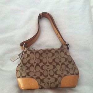 Over the shoulder coach bag.