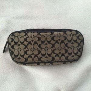 Coach sunglasses case.