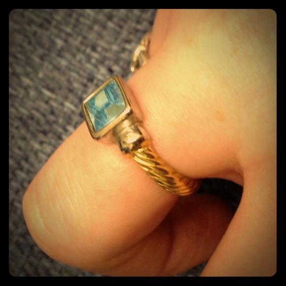 Gold, silver, and blue stone ring
