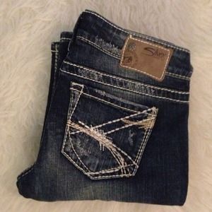 Silver jeans with an old finish